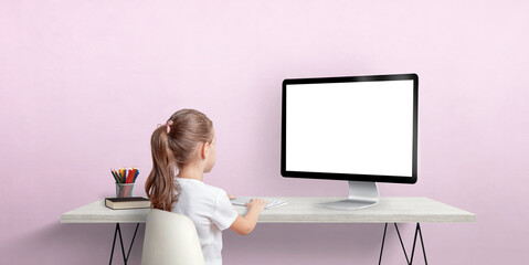 Canvas Print - young girl work on computer concept. isolated computer display for mockup. work room with pink wall.