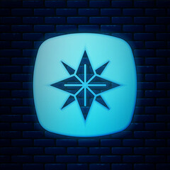 Sticker - Glowing neon Wind rose icon isolated on brick wall background. Compass icon for travel. Navigation design. Vector