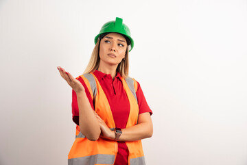 Wall Mural - Portrait of a young female worker looking away