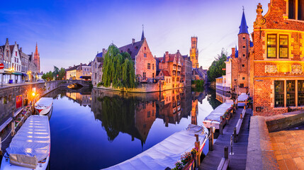 Poster - Bruges, Belgium. Rozenhoedkaai illuminated at night, old town with Belfry reflection