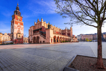Fototapete - Krakow, Poland - Medieval Ryenek Square with the Town Hall Tower