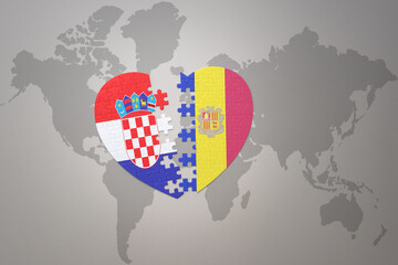 puzzle heart with the national flag of croatia and andorra on a world map background.Concept.