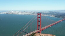 Aerial Rotating Shot Of Golden Gate Bridge And San Francisco Skyline, Bay Area