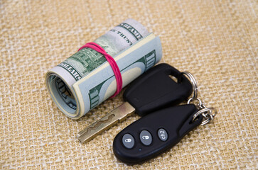 Roll of money and car keys