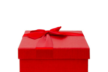 Red gift box with a bow. Isolated on а white background