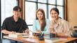 © snowing12 - Education concept, Female tutor and students smiling and looking on camera while study tutorial