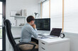 © snowing12 - Software development concept, Male programmer read data code to thoughtful about developing website