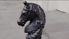 A Tilt Up Shot Of A Hitching Post In The Shape Of A Horse's Head In The French Quarter Of New Orleans, Louisiana, Usa