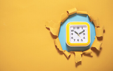 Wall Mural -  Alarm clock with a torn paper.