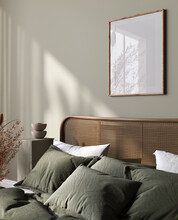 Poster Frame Mockup In Bright Bedroom Interior Background With Rattan Wooden Furniture, 3d Render