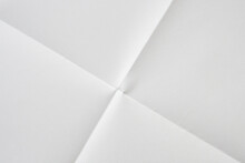 White Folded And Wrinkled Paper Texture Background