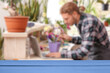 © Pixel-Shot - Empty wooden table in flower shop