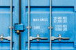 © Austockphoto - Shipping container detail with printing on doors