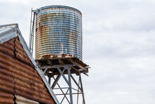 Rusty Corrugated Iron Tank And Shed