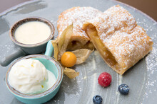 Apple Strudel With Honey And Ice Cream And Fresh Berries