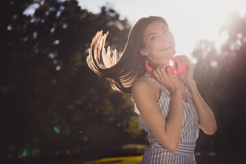 Poster - Portrait of attractive cute cheerful girl listening music going on fresh air spending holiday free time hair flying outdoors