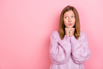 Canvas Print - Photo of doubtful unsure girl dressed knitted pullover looking empty space isolated pink color background