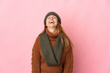 Middle Age Woman With Winter Hat Isolated On Pink Background Laughing