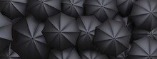 Black Umbrellas Background. Rain Protection For Crowd Concept. Top View, Banner. 3d Render
