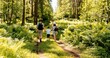 © avtk - Family walking in the woods