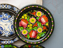 Wooden Plates With Petrikov Paintings At The Fair In Ukraine	

