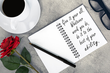 Wall Mural - Motivational and inspirational quote on notebook on white marble table.