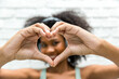 © kanpisut - hands woman show the shape of a heart. heart hand symbol