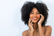 © kanpisut - Portrait of African American woman with bushy curly hairstyle