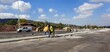 road improvement works, laying curbstones for the construction of road dividing Islands, road construction, worker's at construction site, at work, road, curb stone installation at work 