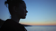 Closeup Woman Silhouette Standing Beach At Sunset. Yoga Girl Enjoying Blue Sky.