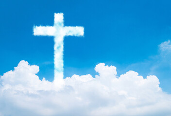 Wall Mural - Christian cross cloud shape on blue sky background