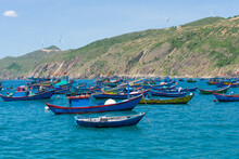 Fishing Boats Are Anchored At The Pier In The Morning On The Blue Seawater