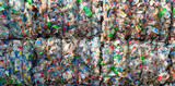Fototapeta  - Close-up of a pile of compressed plastic waste at a waste recycling plant