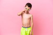 Little Caucasian Boy Wearing A Diving Goggles Isolated On Pink Background Laughing