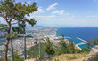 Scenic view in summer day to Antalya city, sea and cable road Tunektepe from the mountain, Turkey.