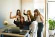 © AntonioDiaz - Female working team celebrating at the office