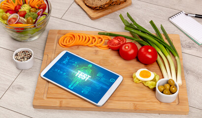 Tablet Pc with fruits, medical concept