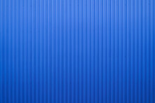 Empty Exterior Wall Of Warehouse Made Of Blue Corrugated Metal Texture Surface Or Galvanize Steel Wall Industrial Building. Stainless Steel, Metal Floor Texture Metallic Background Seamless.
