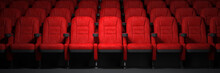 Red Seats Rows In Empty Cinema Hall. Movie Theatre And Cinema Concept.