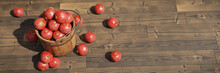 Pomegranates, Juicy Fruits In A Wooden Crate On Wooden Background Banner