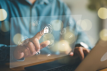 Leinwandbilder - Cybersecurity and privacy concepts to protect data. Business person working on laptop, touch on icon security on virtual screen. Business, technology, internet and networking concept.