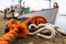 Sweden, Halland, Glommen, Mooring Rope Of Ship Secured In Harbor