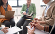 © Halfpoint - Excited elderly people attending group therapy session at nursing house, positive senior man and woman sitting in circle, having conversation with psychologist
