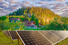 Solar Panels. Solar Power Plant Near Houses. Solar Panels For Cottage Settlement. Renewable Technologies For Production Of Electricity. Alternative Power Plant. Electricity From Rays Of Light.