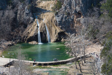 Close-up Turner Falls With People Visiting On Honey Creek In The Arbuckle Mountains Of South-central Oklahoma