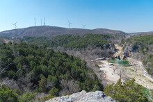 Wide View Of Wind Turbines And Turner Falls On Honey Creek In The Arbuckle Mountains Of South-central Oklahoma
