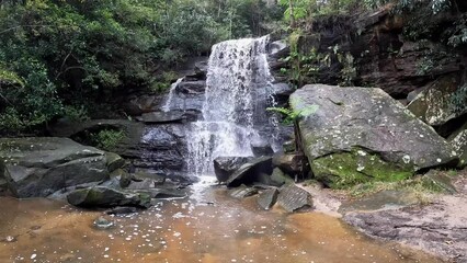 Canvas Print - Waterfall in the rainforest after rain.
