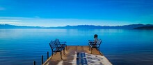 Beautiful View Of Benches On The Pier On Lake Tahoe In The USA