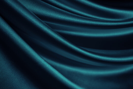 Wall Mural -  - Blue green silk satin. Soft wavy folds. Shiny silky fabric. Dark teal color elegant background with space for design. Curtain. Drapery. Christmas, valentine, anniversary, celebration concept.