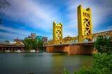 Fototapeta Krajobraz - Gold Tower Bridge and Sacramento River in Sacramento, California